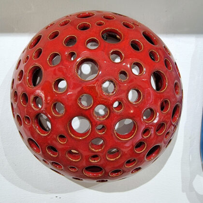 Applique Ø. cm 24  sezione tornio, traforato rosso